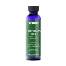  Fragrance Oil Christmas Tree by Aromar. Capture the magic of Christmas morning with top notes of pine and fresh lime, middle notes of cardamom and pepper, and base notes of Scotch pine. Happy holidays!