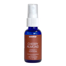  Image of Aromar Cherry Almond Air Freshener, a harmonious blend of classic cherry with warm almonds for a cozy and relaxing fragrance, designed to neutralize odors and provide long-lasting scent, made in the USA.